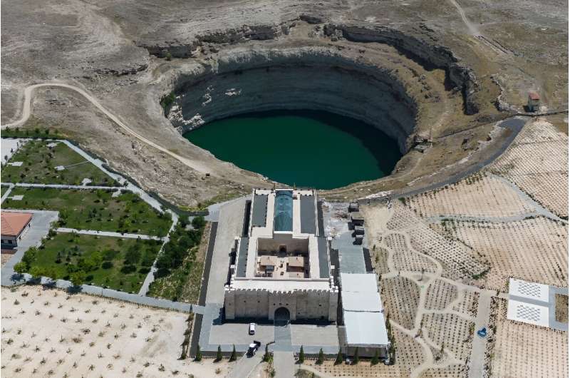 One sinkhole is next to an 800-year-old Seljuk caravanserai in Karapinar in the central Turkey