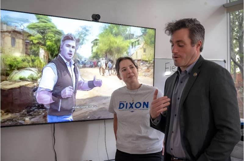 Peter Dixon talks with communications director Taylor Hebble; on the screen behind them is an artificially generated picture of Dixon, a military veteran, in Afghanistan