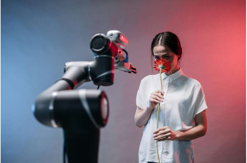 robot smelling flower