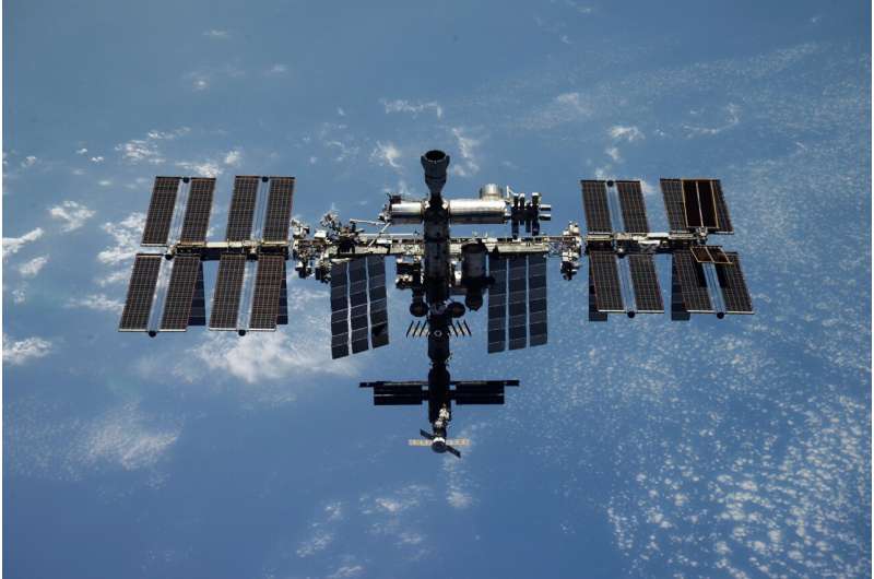 Russian space officials say air leak at International Space Station poses no danger to its crew