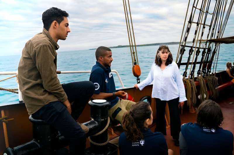 Sarah Darwin, the great-great-granddaughter of Charles Darwin, on board the  Oosterschelde with other members of a scientific expedition