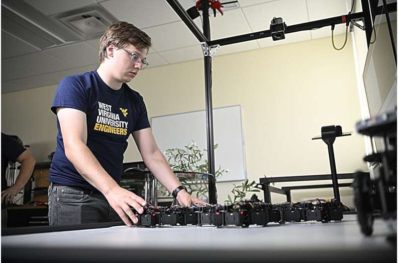 Shape-shifting WVU robot inspired by insect swarms and tree roots is teaching itself to mark contamination zones