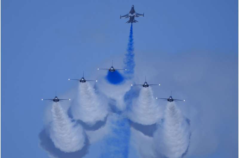 Singapore Airshow features aerial displays and the international debut of China's C919