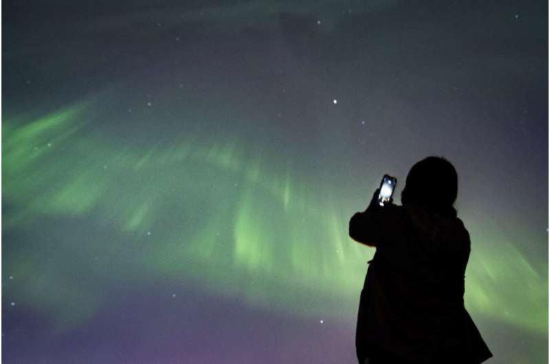 Solar storm puts on brilliant light show across the globe, but no serious problems reported