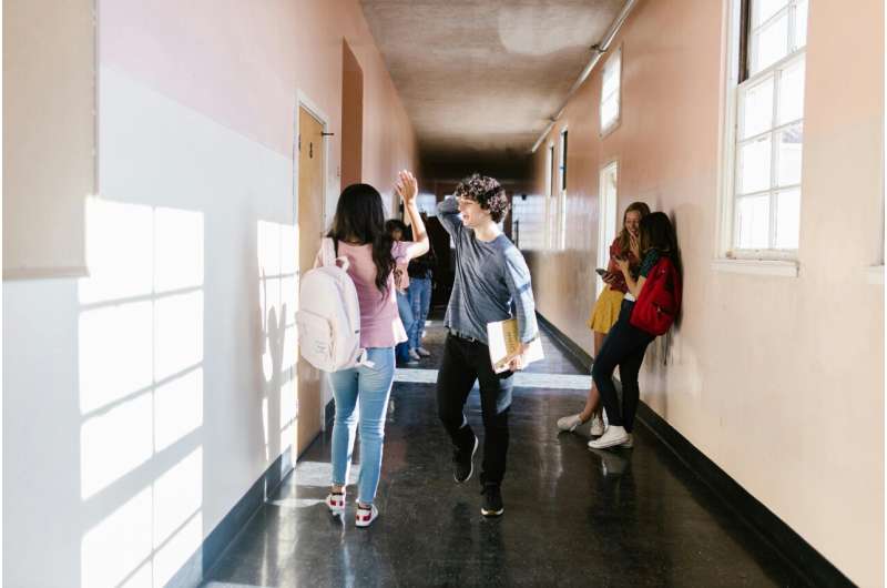 students in school hallway