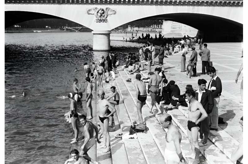 Swimmers take an illegal dip in the Seine during a heatwave in 1946