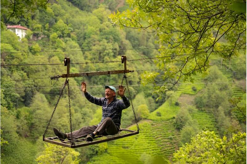 Tea-growing villagers above the city of Rize in northeast Turkey make perilous trips to and from their fields every day