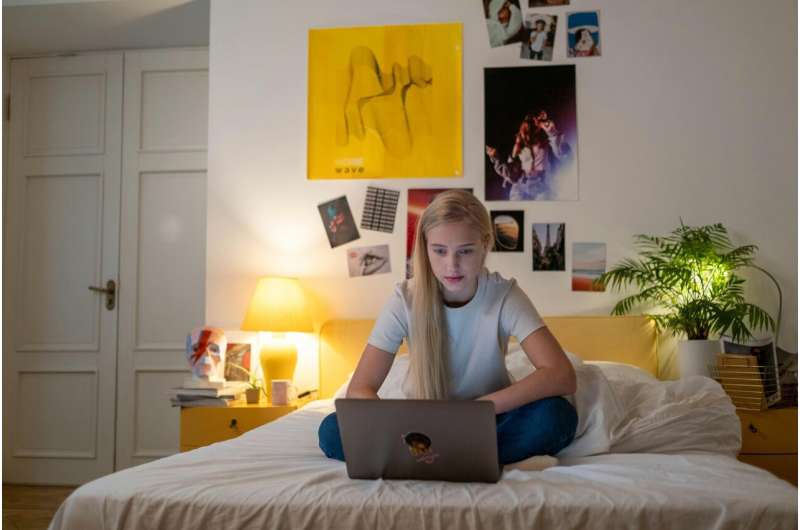 teen watching screen