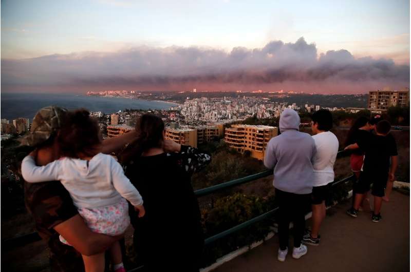 The fires have enveloped Valparaiso in a thick mushroom cloud of smoke