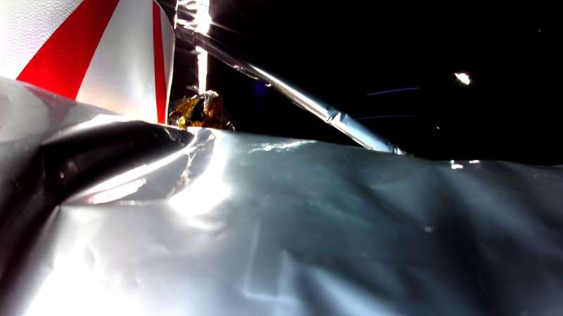 This image released by Astrobotic on January 8, 2024 shows the first picture from Astrobotic's Peregrine Lunar Lander in space, with Multi-Layer Insulation in the foreground
