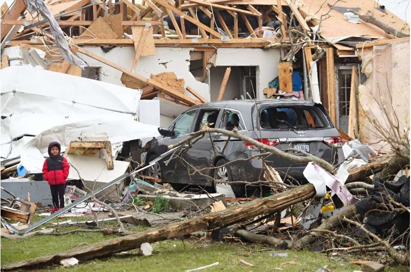 Tornadoes killed three people and destroyed dozens of homes when they swept through Kentucky, Indiana and Ohio on March 15 -- including in Indian Lake, Ohio