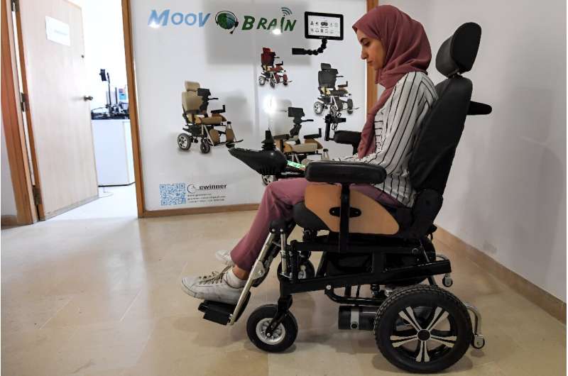 Tunisian engineer Souleima Ben Tamime tests a prototype of her team's new wheelchair system