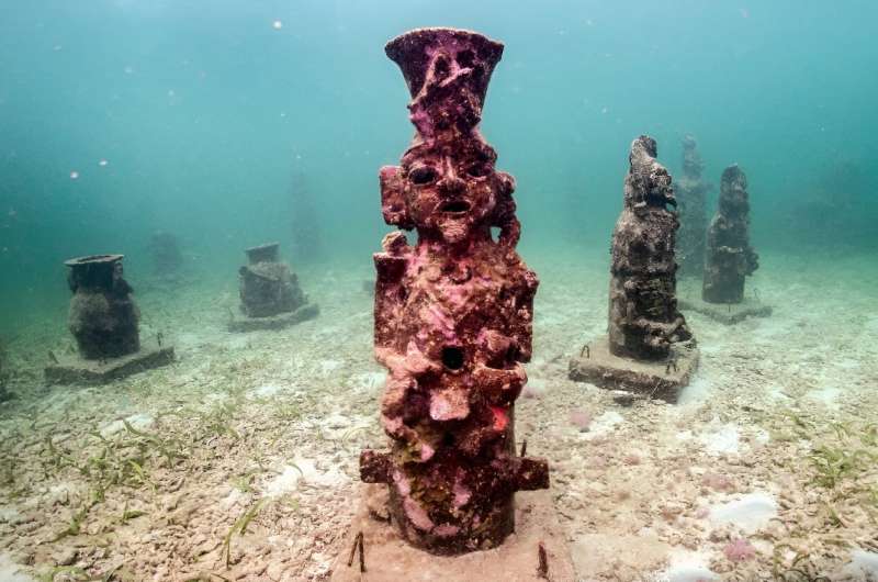 Twenty-five sculptures scatter the Caribbean seafloor off Colombia's coast, where they host coral growth