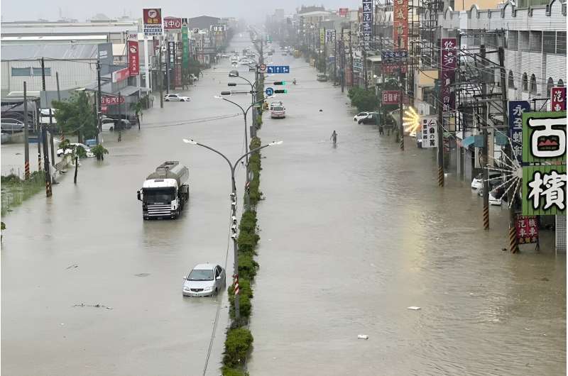 Typhoon Gaemi swept towards southern China on Thursday after killing at least two people in Taiwan