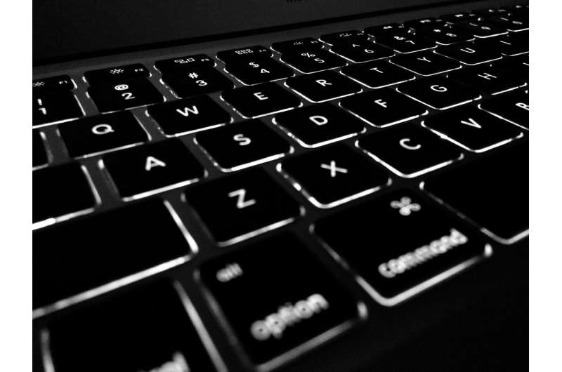 typing at computer
