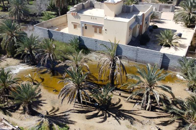Water-logged earth near a home in Libya's coastal city of Zliten