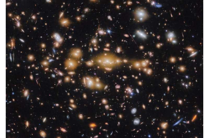 Webb Space Telescope captures star clusters in Cosmic Gems arc