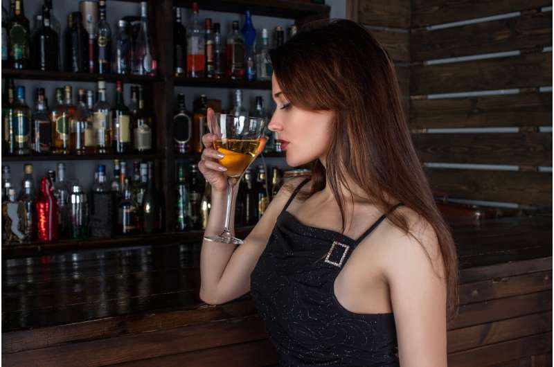 woman drinking wine