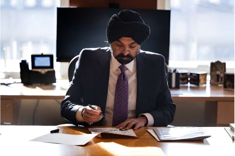 World Bank President Ajay Banga works at his desk at the World Bank headquarters in Washington, DC, on January 3, 2024