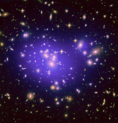 Astronomers use galactic magnifying lens to probe elusive dark energy