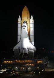 Space shuttle Discovery fixed, back on launch pad (AP)