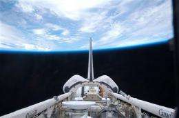 Space shuttle closing in for space station docking (AP)