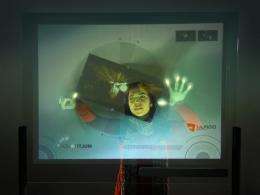 Multitouch 'Skin' Transforms Surfaces Into Interactive Screens