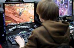 A boy plays the computer game "World of Warcraft"