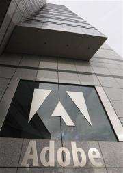 Adobe posts lower 1Q profit, exceeds expectations (AP)