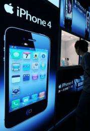 A man looks at the iPhone 4