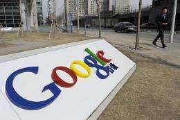 A man walks past the Google company logo outside the Google China headquarters in Beijing in March