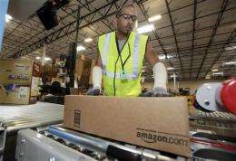 Amazon profit climbs 71 percent in 4th qtr (AP)
