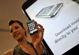 A model holds a 3G iPhone during its launch in Hong Kong