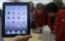 Apple 1Q dazzles investors, distracts from Jobs (AP)