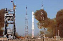 A Proton-M rocket, carrying the Russian Glonass-M satellites, blasts off