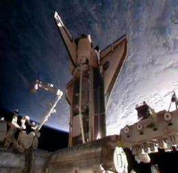 Astronauts embark on 1st spacewalk of mission (AP)