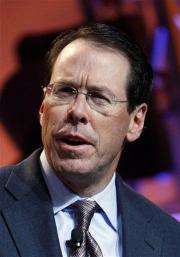 AT&amp;amp;T will take $1B non-cash charge for health care (AP)