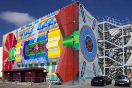 ATLAS collaboration unveils giant mural at CERN