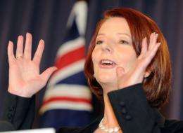 Australian Prime Minister Julia Gillard has clashed with challenger Tony Abbott over national broadband network plans