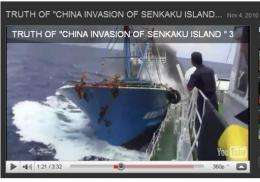 A video grab image uploaded on YouTube shows a Chinese fishing boat clashing with Japan's Coast Guard vessel