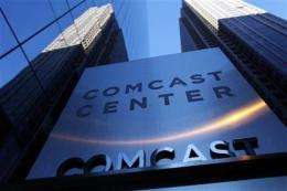 Comcast drives growth with pricier bundles (AP)
