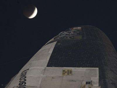 Discovery and the Lunar Eclipse