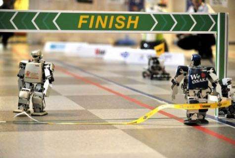 Five bipedal machines began the non-stop 42.2-kilometre contest on a 100-metre indoor track in Osaka