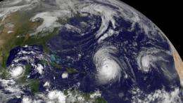 GOES-13 sees a weaker Hurricane Julia in the 'tropical trio'