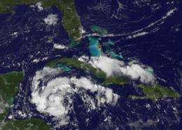 GOES-13 sees system 92L looking more like a tropical depression