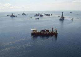 Gulf relief well crews watch for tropical weather (AP)