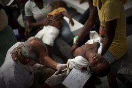 Haiti's cholera death toll grows, fueling riots (AP)