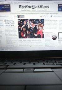 In this photo illustration the NYTimes.com Web site is displayed on a laptop