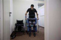 Israeli device lets paralyzed people stand, walk (AP)