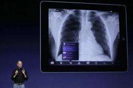 Jobs, on medical leave, appears at iPad event (AP)
